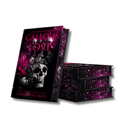 A stack of hardcover books with a dark gothic design, featuring a large skull and roses on the front cover with the title 'Callous Love' and author name 'Charmaine Pauls' in pink text, shown on a black background.