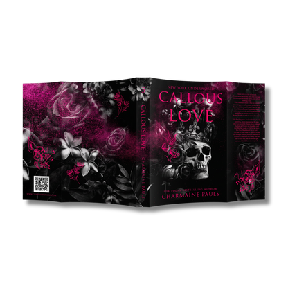 The special edition dust jacket of 'Callous Love' by Charmaine Pauls, featuring a black and white floral design with a skull and vibrant hot pink accents, shown against a plain white background.