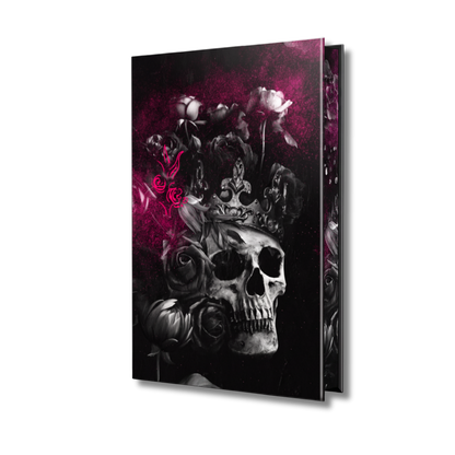 Special edition hardcover book of 'Callous Love' by Charmaine Pauls, featuring a black-and-white skull surrounded by dark roses and a crown, with vivid magenta floral accents on a black background.