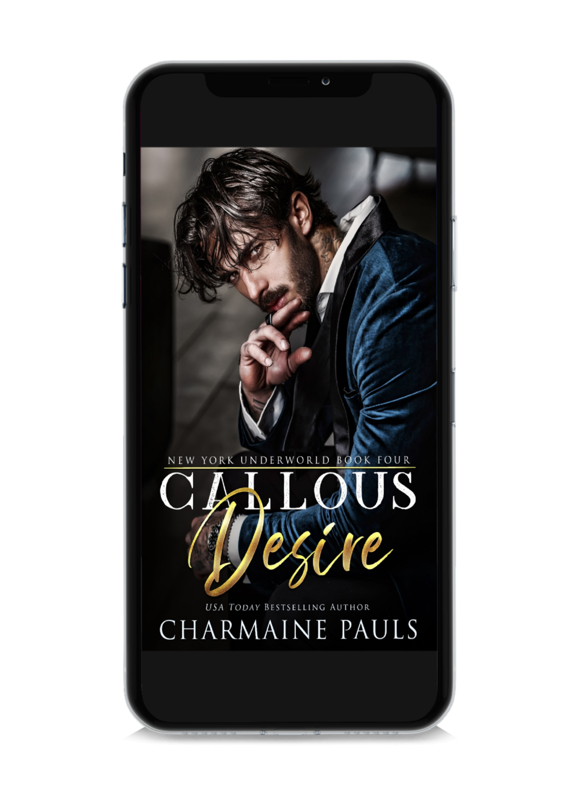 A cell phone displaying the book cover of 'Callous Desire' by Charmaine Pauls.
